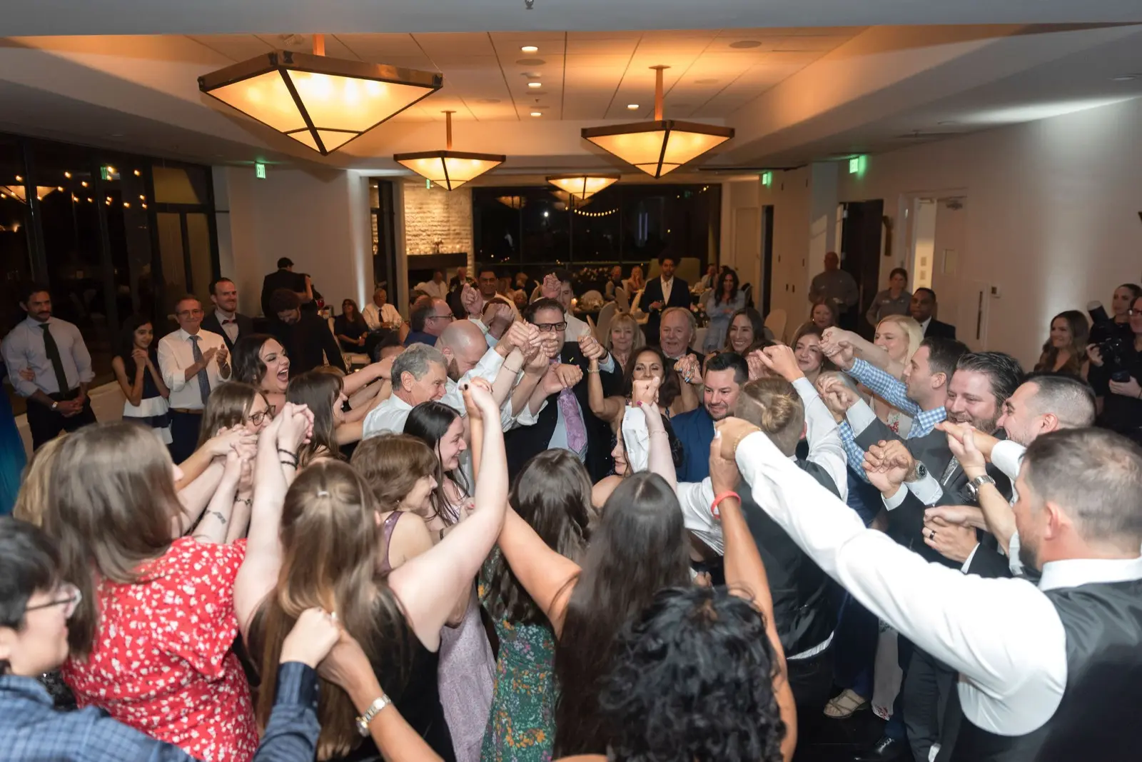 Guests in a packed dance circle