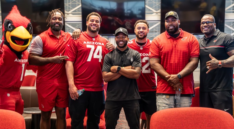 DJ Take2 with Arizona Cardinals players